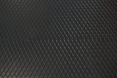 Siyah metal desenli çelik arka plan. Delinmiş metal levha.