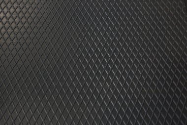 Siyah metal desenli çelik arka plan. Delinmiş metal levha.