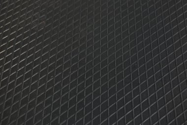 Siyah metal desenli çelik arka plan. Delinmiş metal levha.