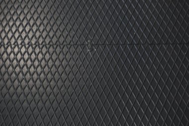 Siyah metal desenli çelik arka plan. Delinmiş metal levha.