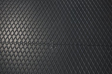 Siyah metal desenli çelik arka plan. Delinmiş metal levha.