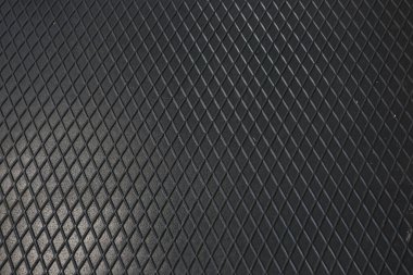 Siyah metal desenli çelik arka plan. Delinmiş metal levha.