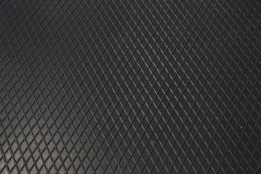 Siyah metal desenli çelik arka plan. Delinmiş metal levha.