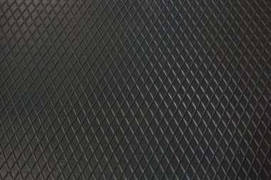 Siyah metal desenli çelik arka plan. Delinmiş metal levha.