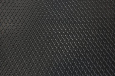 Siyah metal desenli çelik arka plan. Delinmiş metal levha.