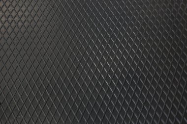 Siyah metal desenli çelik arka plan. Delinmiş metal levha.