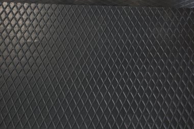 Siyah metal desenli çelik arka plan. Delinmiş metal levha.