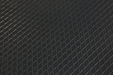 Siyah metal desenli çelik arka plan. Delinmiş metal levha.