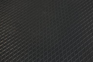 Siyah metal desenli çelik arka plan. Delinmiş metal levha.