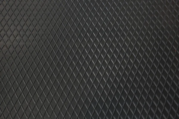 Siyah metal desenli çelik arka plan. Delinmiş metal levha.