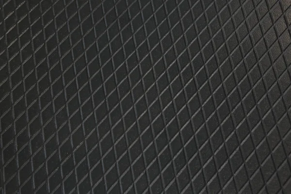 Siyah metal desenli çelik arka plan. Delinmiş metal levha.