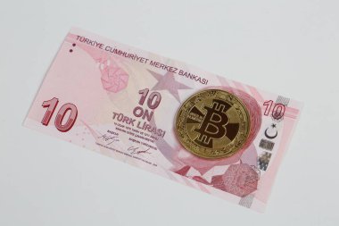 Türk lira banknotları ve bitcoin paraları