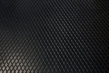 Siyah metal desenli çelik arka plan. Delinmiş metal levha.