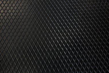 Siyah metal desenli çelik arka plan. Delinmiş metal levha.