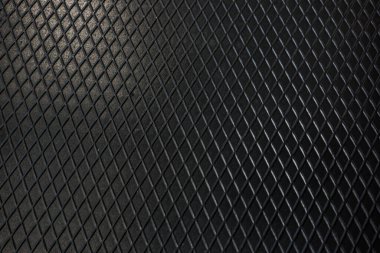 Siyah metal desenli çelik arka plan. Delinmiş metal levha.