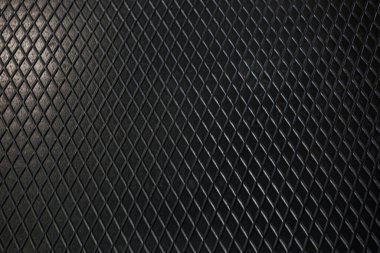 Siyah metal desenli çelik arka plan. Delinmiş metal levha.