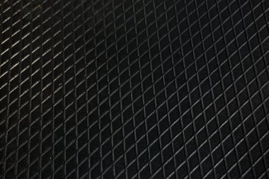 Siyah metal desenli çelik arka plan. Delinmiş metal levha.