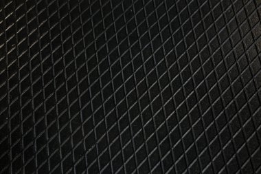 Siyah metal desenli çelik arka plan. Delinmiş metal levha.