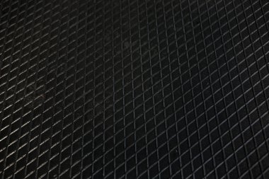 Siyah metal desenli çelik arka plan. Delinmiş metal levha.