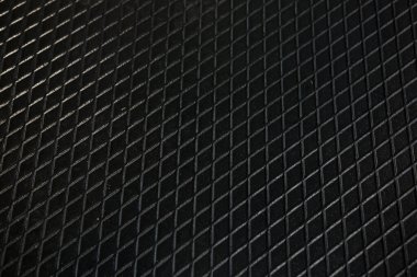 Siyah metal desenli çelik arka plan. Delinmiş metal levha.