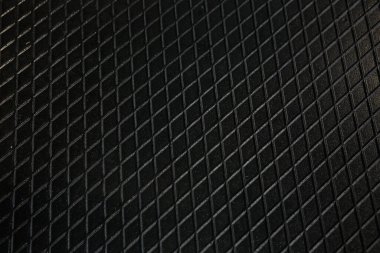 Siyah metal desenli çelik arka plan. Delinmiş metal levha.