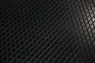 Siyah metal desenli çelik arka plan. Delinmiş metal levha.