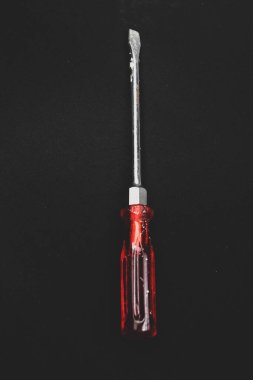 Plastik saplı tornavida.