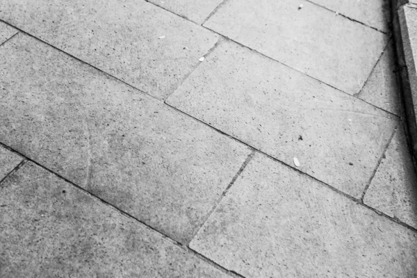 灰色のレンガの石畳のテクスチャの背景 — ストック写真