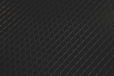 Siyah metal desenli çelik arka plan. Delinmiş metal levha.