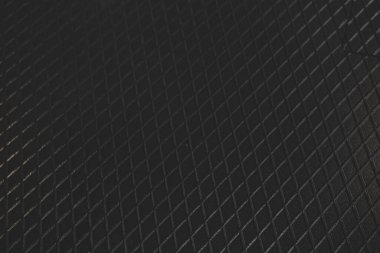 Siyah metal desenli çelik arka plan. Delinmiş metal levha.