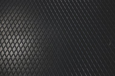 Siyah metal desenli çelik arka plan. Delinmiş metal levha.