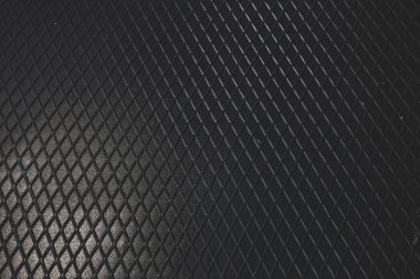 Siyah metal desenli çelik arka plan. Delinmiş metal levha.