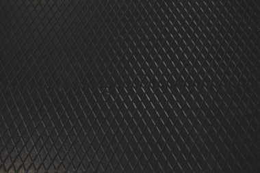 Siyah metal desenli çelik arka plan. Delinmiş metal levha.