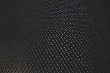 Siyah metal desenli çelik arka plan. Delinmiş metal levha.