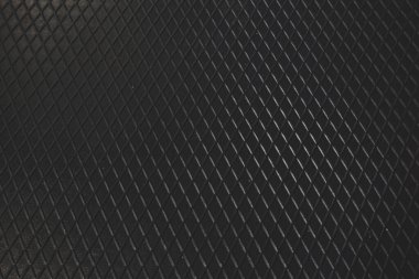 Siyah metal desenli çelik arka plan. Delinmiş metal levha.