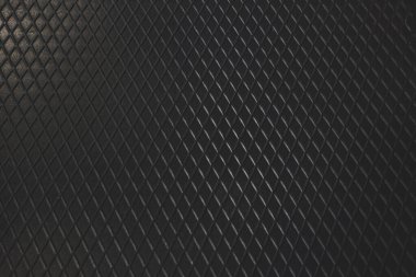 Siyah metal desenli çelik arka plan. Delinmiş metal levha.
