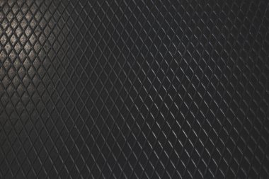 Siyah metal desenli çelik arka plan. Delinmiş metal levha.