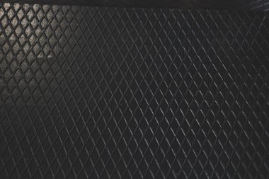 Siyah metal desenli çelik arka plan. Delinmiş metal levha.