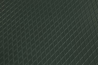 Siyah metal desenli çelik arka plan. Delinmiş metal levha.