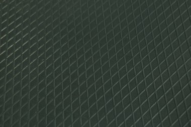 Siyah metal desenli çelik arka plan. Delinmiş metal levha.