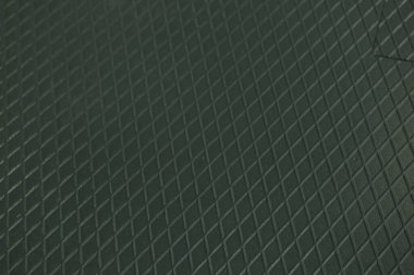 Siyah metal desenli çelik arka plan. Delinmiş metal levha.