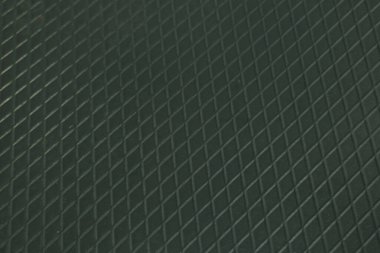 Siyah metal desenli çelik arka plan. Delinmiş metal levha.