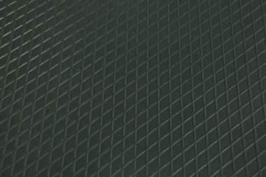 Siyah metal desenli çelik arka plan. Delinmiş metal levha.