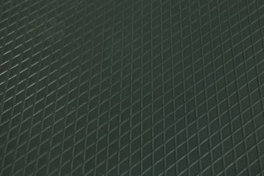 Siyah metal desenli çelik arka plan. Delinmiş metal levha.