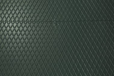 Siyah metal desenli çelik arka plan. Delinmiş metal levha.