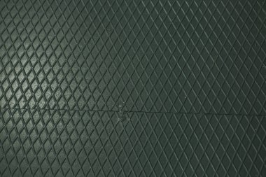 Siyah metal desenli çelik arka plan. Delinmiş metal levha.