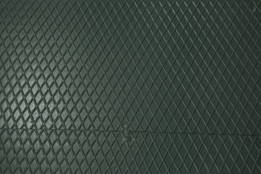 Siyah metal desenli çelik arka plan. Delinmiş metal levha.