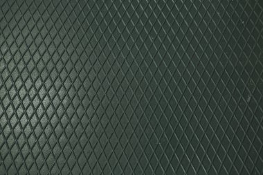 Siyah metal desenli çelik arka plan. Delinmiş metal levha.