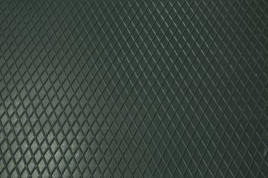 Siyah metal desenli çelik arka plan. Delinmiş metal levha.