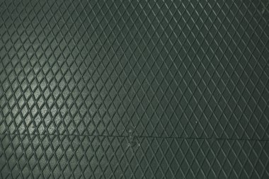 Siyah metal desenli çelik arka plan. Delinmiş metal levha.